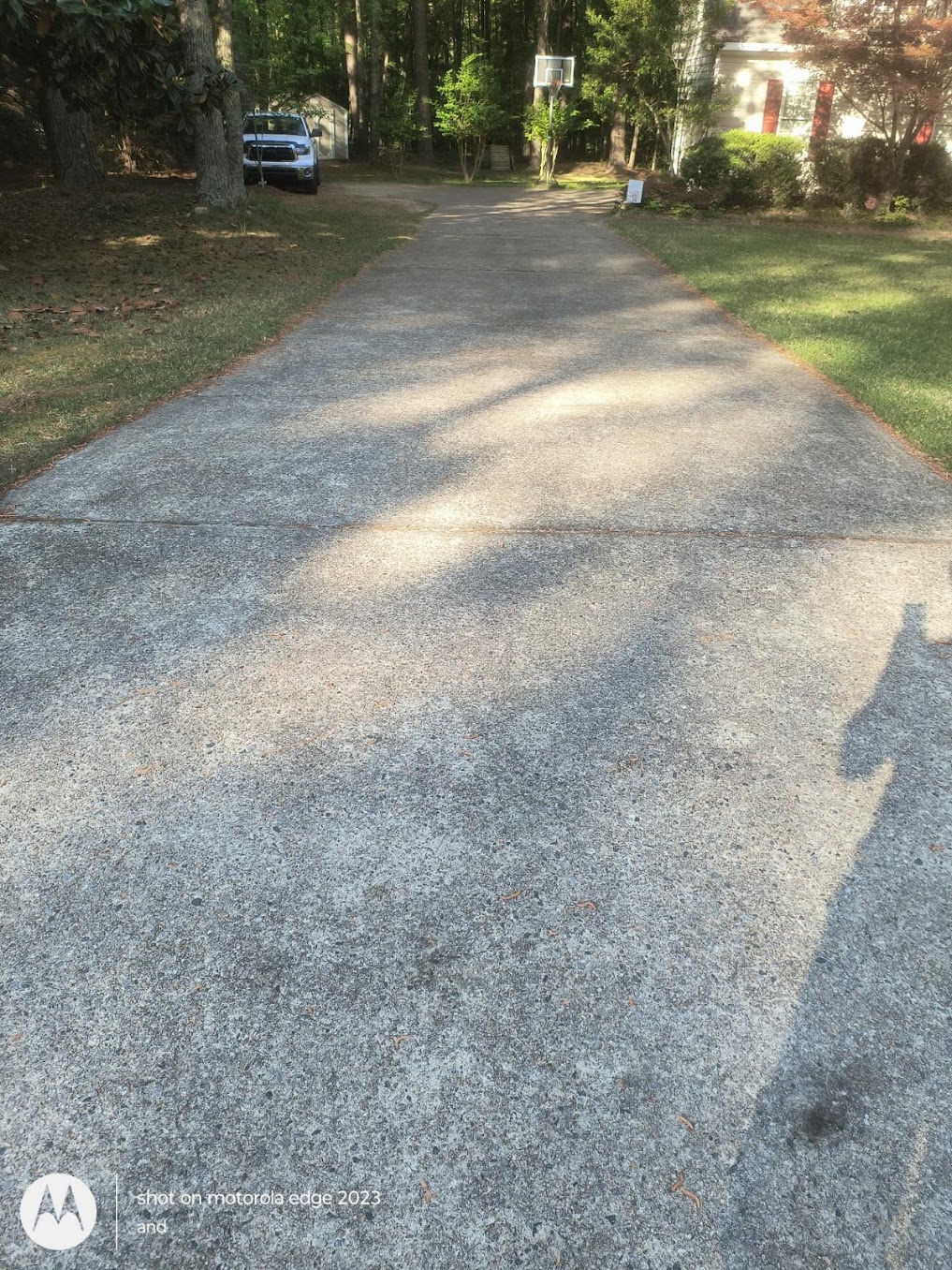 Driveway before pressure washing